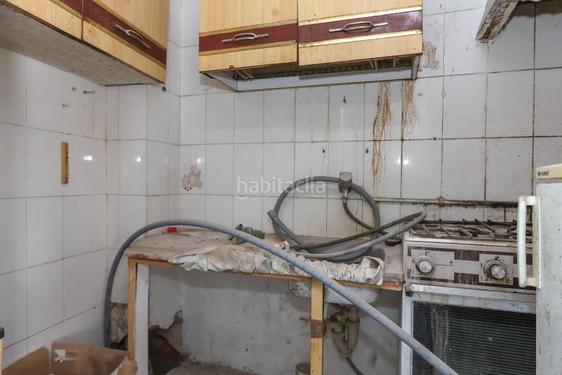 Foto 04f60fbe-0c56-46fe-93ac-70c68ac3c2c2. Casa  adosada con bar/tienda en Tolox