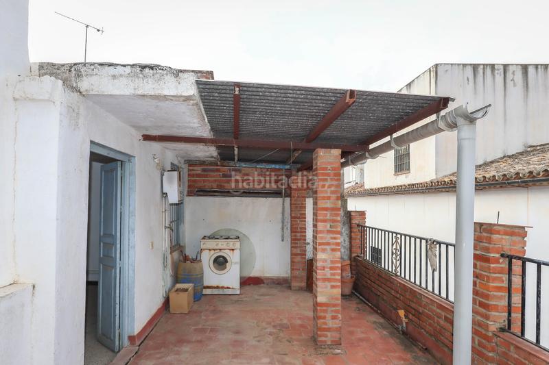 Foto 2bbbcaf6-5ee7-40ec-b244-5375f9ce9d64. Casa  adosada con bar/tienda en Tolox