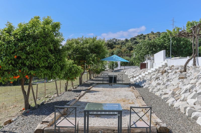 Foto a201fe90-ae8e-416e-8621-0dcdc91331aa. Casa amb xemeneia aparcament piscina a Coín