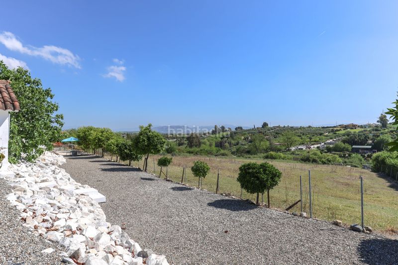 Foto bc89a18d-505d-4280-a7fe-cf5cd977a894. Casa amb xemeneia aparcament piscina a Coín