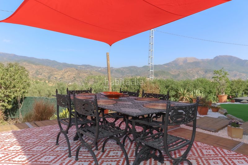Foto 0f298449-5bdc-497b-a966-41e4c0e0f2b4. Casa amb xemeneia aparcament piscina a Tolox