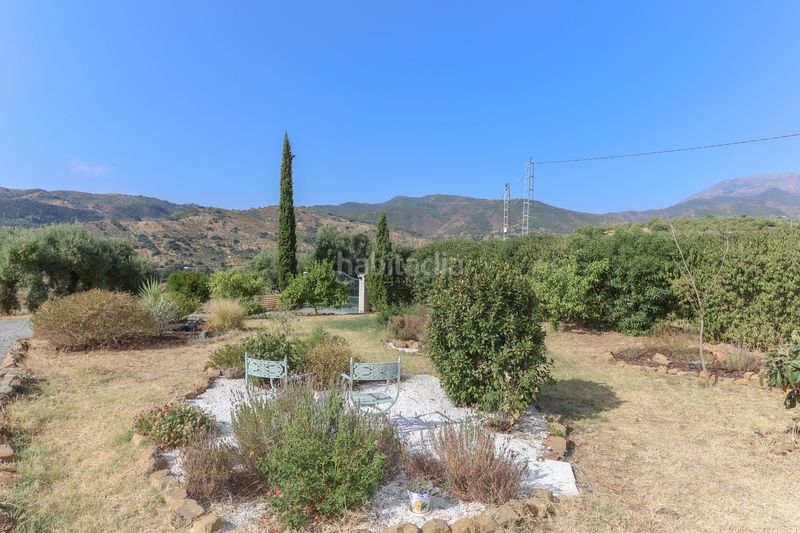 Foto 2566d085-8f7e-4dcd-9c2b-30e1439e086b. Casa amb xemeneia aparcament piscina a Tolox