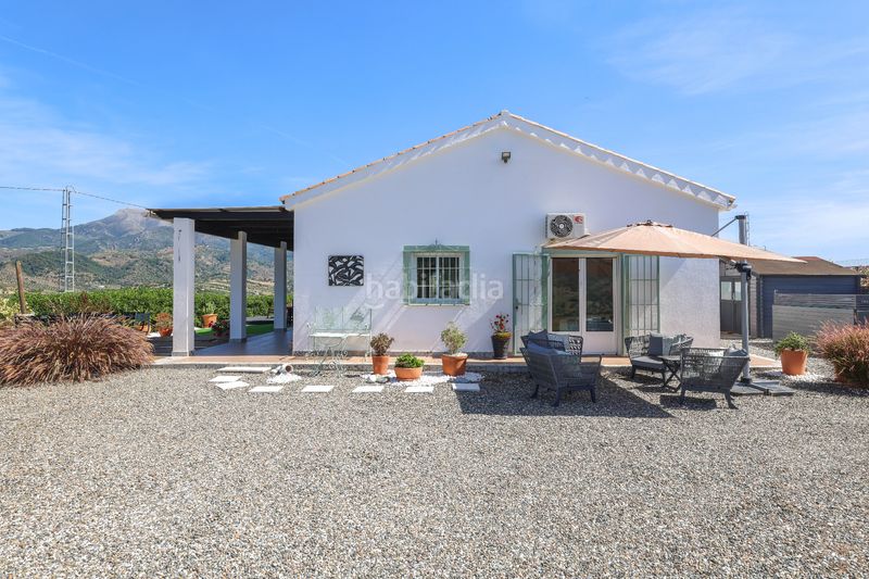 Foto 43474093-0b29-4492-9519-10a928b16451. Casa amb xemeneia aparcament piscina a Tolox