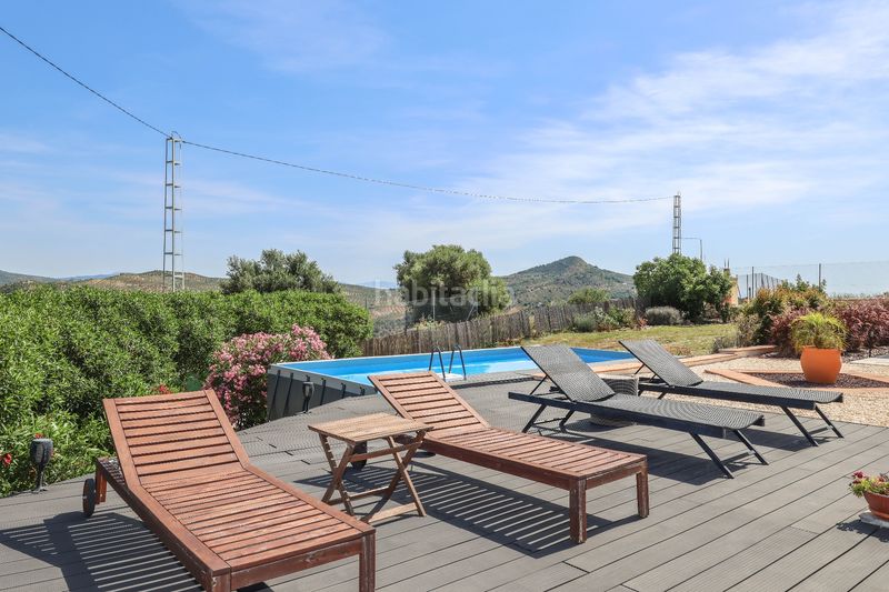 Foto 514ceb89-0f0a-43da-9ffa-6727b52f6a9a. Casa amb xemeneia aparcament piscina a Tolox