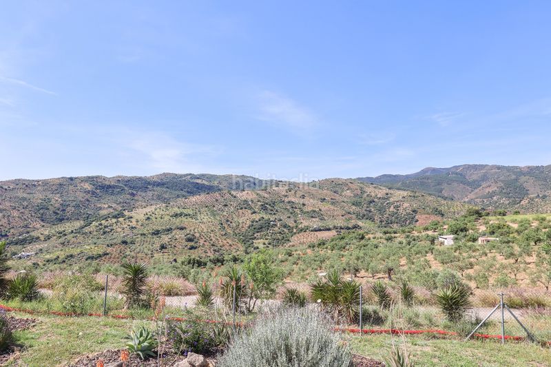 Foto 58da9cd6-5b01-46cd-bb93-582c3fc84f04. Casa amb xemeneia aparcament piscina a Tolox