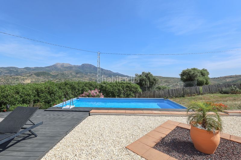 Foto 68bbf1a9-9220-4882-80e6-eeeba300057a. Casa amb xemeneia aparcament piscina a Tolox