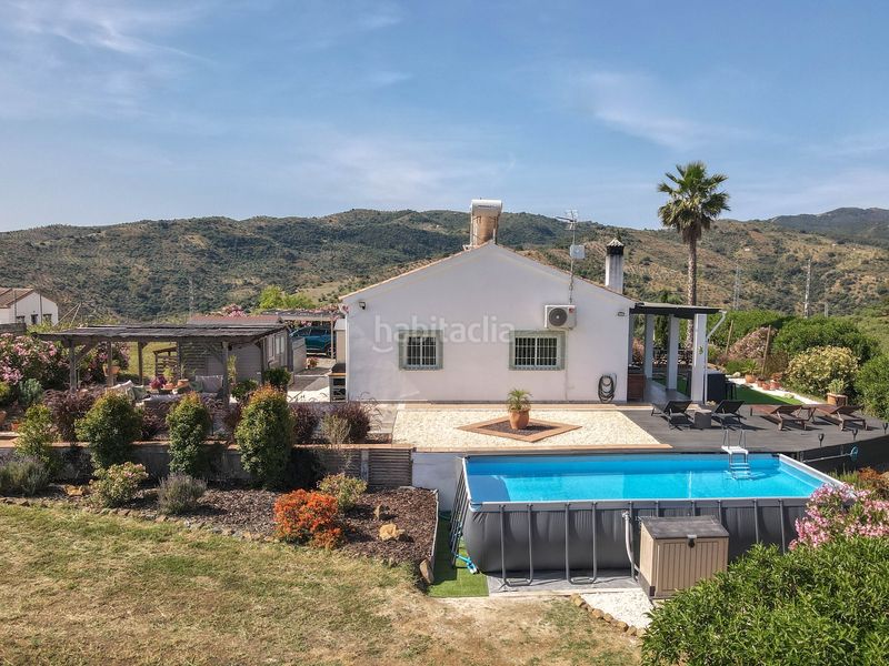 Foto b13883fa-8115-4ef0-a175-cceacba50c61. Casa amb xemeneia aparcament piscina a Tolox