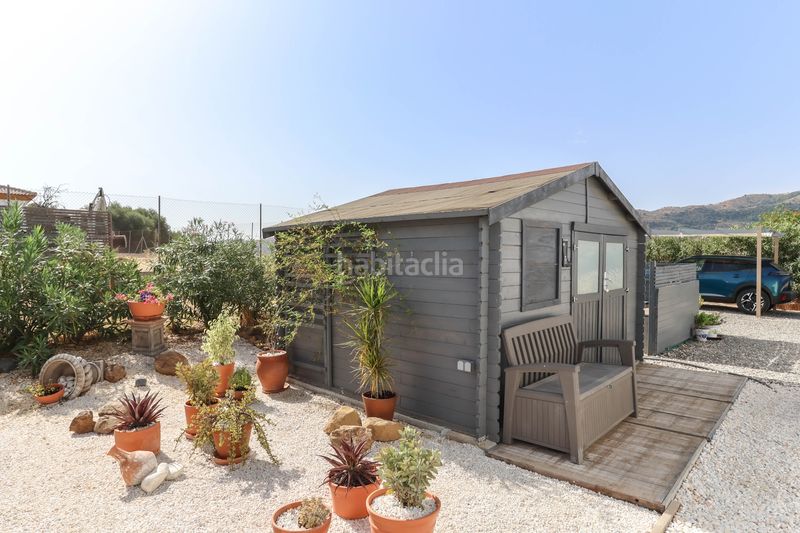 Foto f27dc000-5ff9-4017-9207-9376257fde66. Casa amb xemeneia aparcament piscina a Tolox