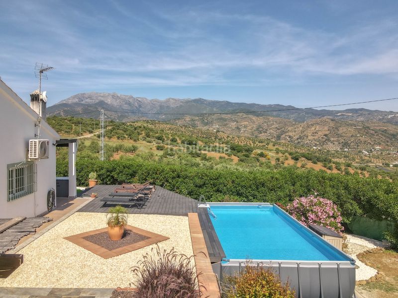 Foto f9f98cc4-c0de-4bad-9830-ff1349443d8b. Casa amb xemeneia aparcament piscina a Tolox