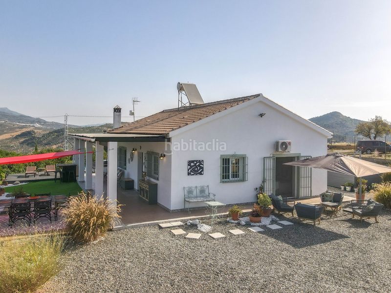 Foto fa8a817f-b57d-4868-a713-ad46b1041718. Casa amb xemeneia aparcament piscina a Tolox