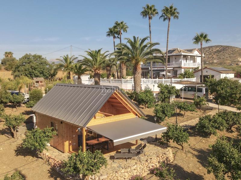 Foto 2584ff74-6626-433b-821a-d49c09fe7e5e. Chalet avec cheminée parking piscine dans Centro Alhaurín el Grande