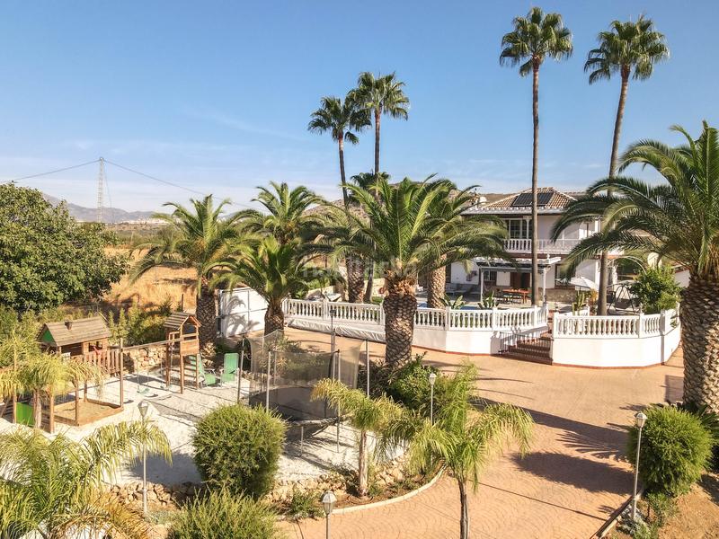 Foto 3d02aeda-1809-44bc-b1a6-910f39fdb5d7. Chalet avec cheminée parking piscine dans Centro Alhaurín el Grande