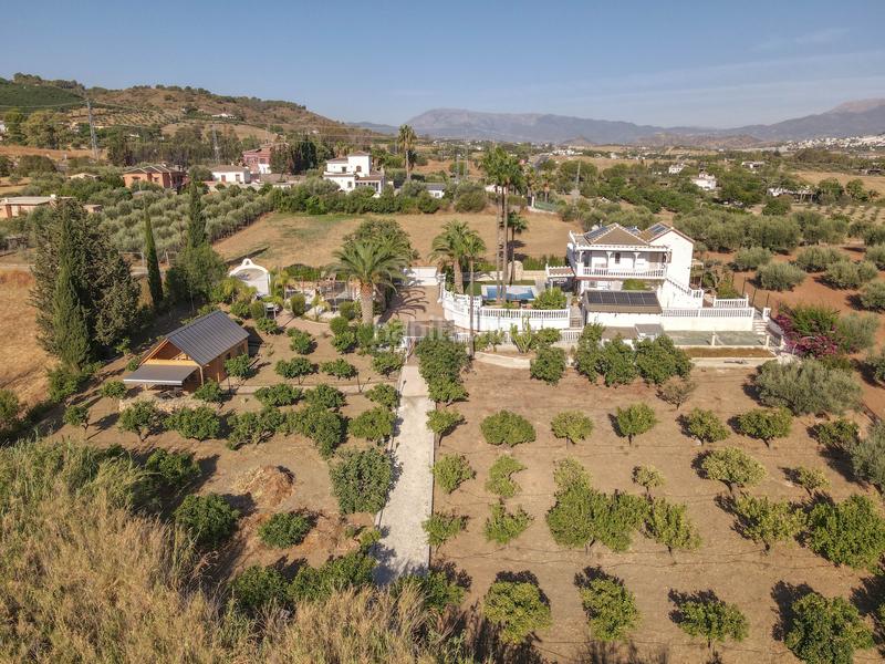 Foto 3ddccc7b-e62c-47ad-96a2-7cfd3a62ff2e. Chalet avec cheminée parking piscine dans Centro Alhaurín el Grande