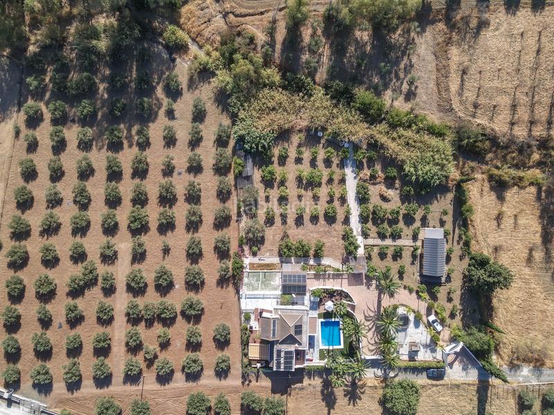 Foto 532c0d9e-e171-4e7b-a8fa-e31e0644ae25. Chalet avec cheminée parking piscine dans Centro Alhaurín el Grande