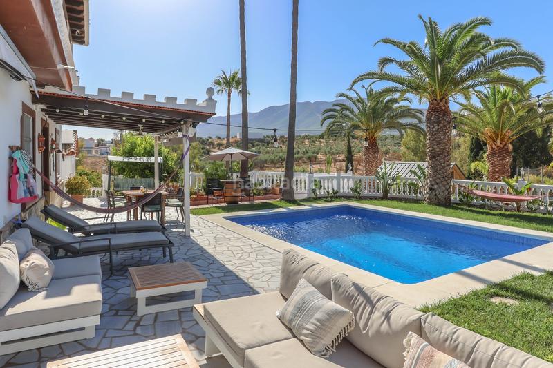 Foto 74ad0432-e762-4603-a72e-ae5498630ccc. Chalet avec cheminée parking piscine dans Centro Alhaurín el Grande