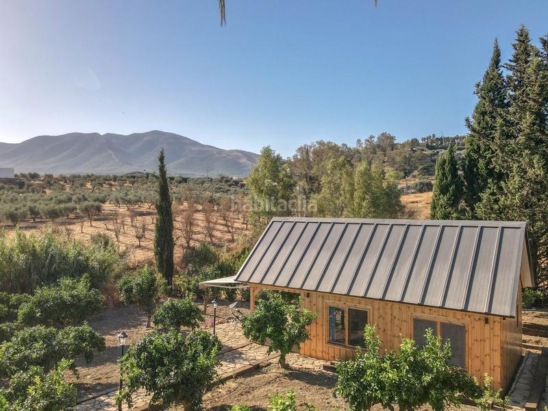 Foto 8ebe56bc-5730-480b-b627-0c6bad63f4ae. Chalet avec cheminée parking piscine dans Centro Alhaurín el Grande