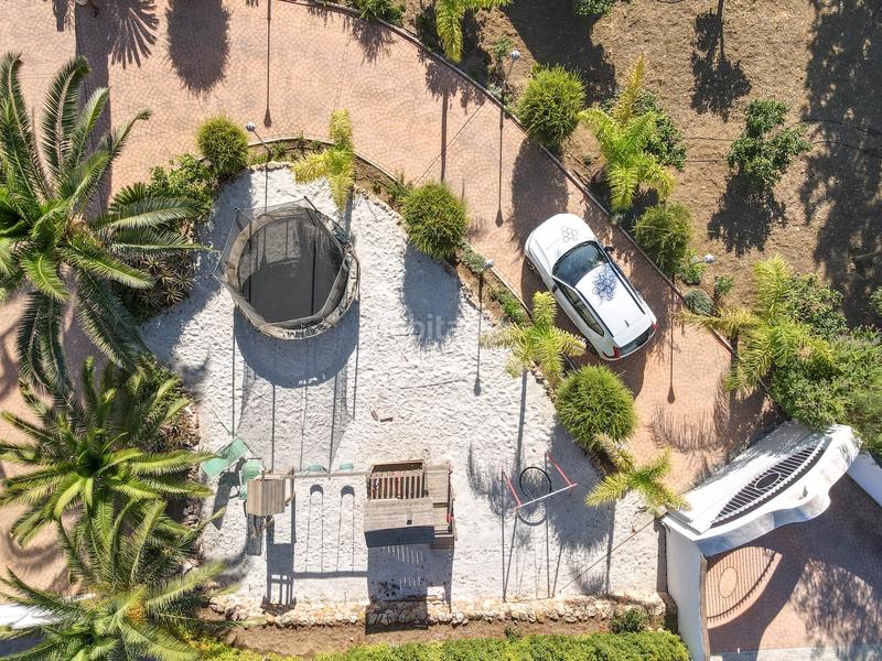 Foto bddd187a-6d7b-42e6-b9b3-ff09ebfe38b0. Chalet avec cheminée parking piscine dans Centro Alhaurín el Grande