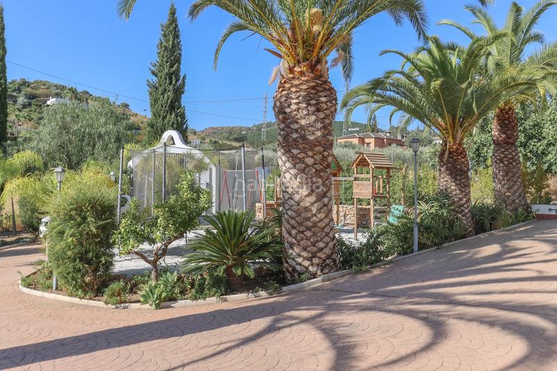 Foto c39f482c-ac49-4f68-858c-b56c348b637c. Chalet avec cheminée parking piscine dans Centro Alhaurín el Grande