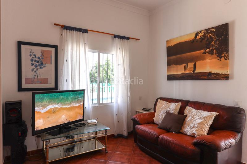 Foto 5c081365-2d61-49c7-bd0d-f62c7632ee27. Casa amb xemeneia aparcament piscina a Centro Alhaurín el Grande