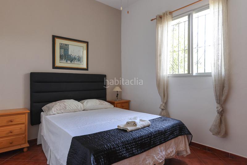 Foto f231b9a9-c887-4968-b206-ef72a36b2472. Casa amb xemeneia aparcament piscina a Centro Alhaurín el Grande