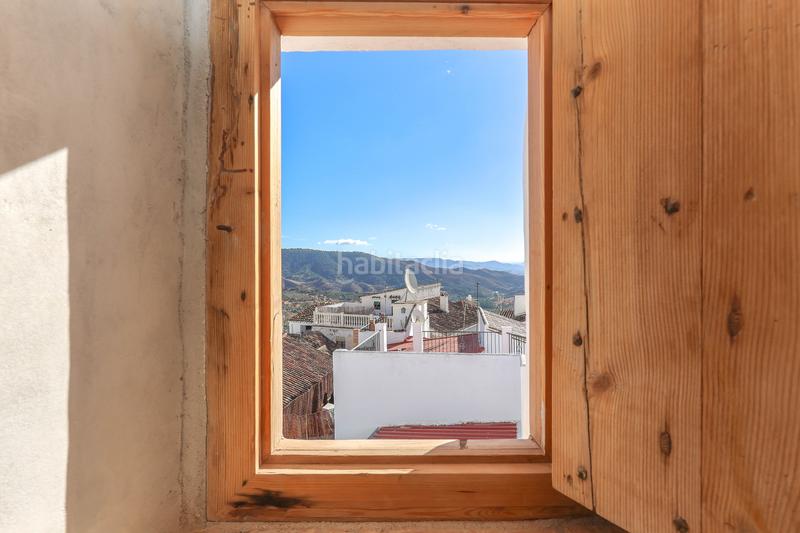 Foto b9540a8a-7c63-4aeb-a11f-0fb873fef0bb. Casa aparellada a Casarabonela