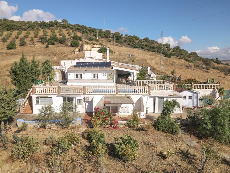 Foto 17015af5-c2e5-4d8b-8a38-4e47f13f6e57. Casa a schiera con camino parcheggio piscina in Guaro