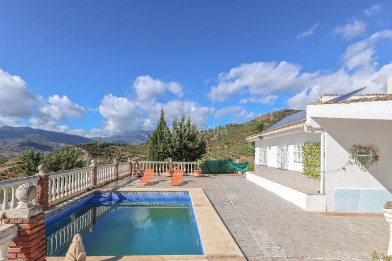 Foto 9c192fdc-d2d5-4e4c-91aa-5f096a95d35a. Casa a schiera con camino parcheggio piscina in Guaro