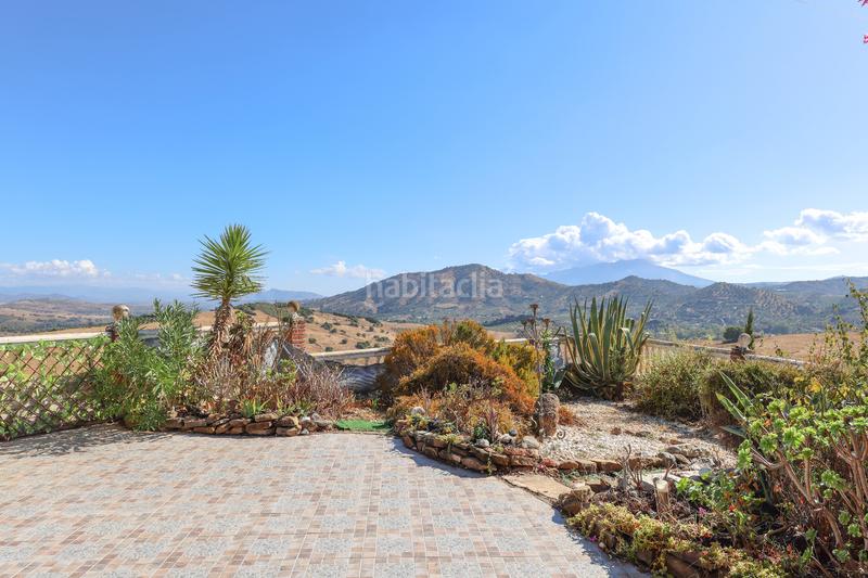 Foto c8f05ab3-d934-4053-9364-fc901b46e3a4. Casa a schiera con camino parcheggio piscina in Guaro