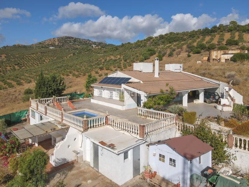 Foto d1f14a30-988f-4f8e-85b3-d619e2ba3e31. Casa a schiera con camino parcheggio piscina in Guaro