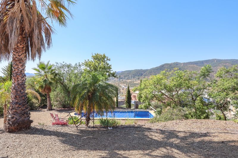 Foto 314c5c7c-fe70-46b2-b26a-10632d4b1349. Casa amb piscina a Tolox