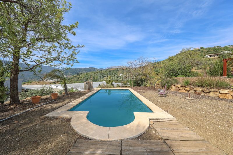 Foto 7cde35ac-ce79-46b9-a902-739d1a9afd7c. Casa amb piscina a Tolox