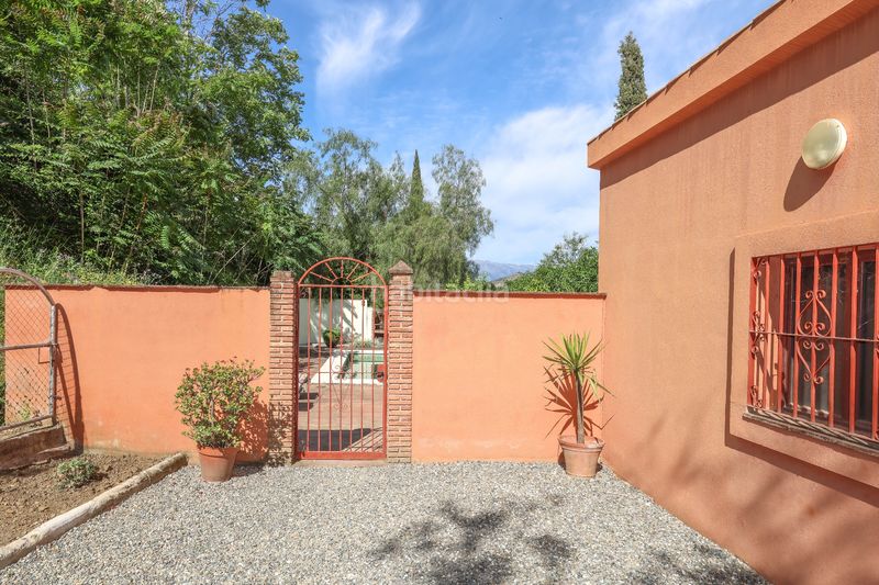 Foto cd9ad14c-3e4a-4b97-817b-d29493a93348. Casa amb piscina a Coín