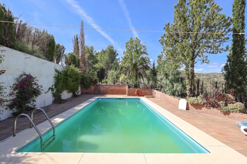 Foto 07478b3a-7d71-457b-9839-59d97498afea. Casa amb xemeneia aparcament piscina a Guaro