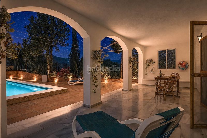 Foto 7a754f8a-480a-402e-a95a-85b035f48cbf. Casa amb xemeneia aparcament piscina a Guaro