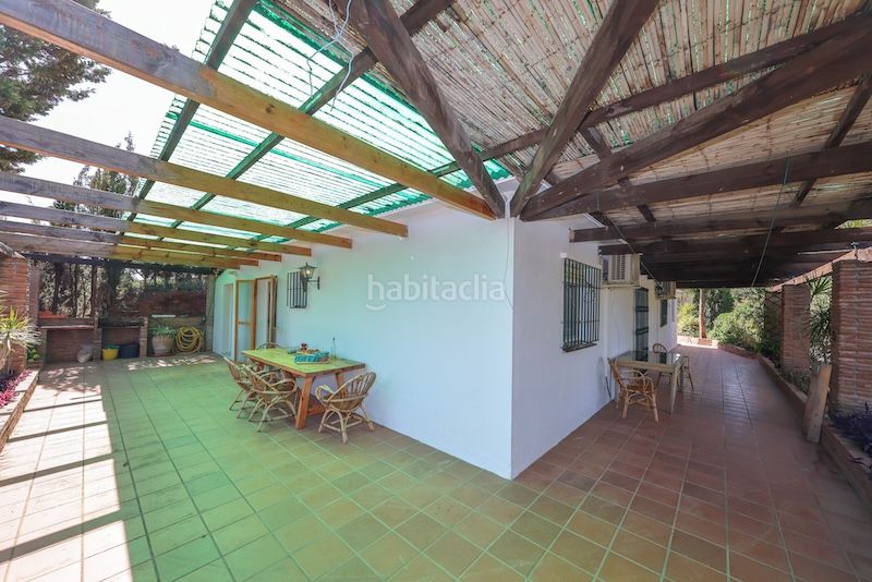 Foto b6c61335-6382-4202-ae8d-1599d95ea5cb. Casa amb xemeneia aparcament piscina a Guaro