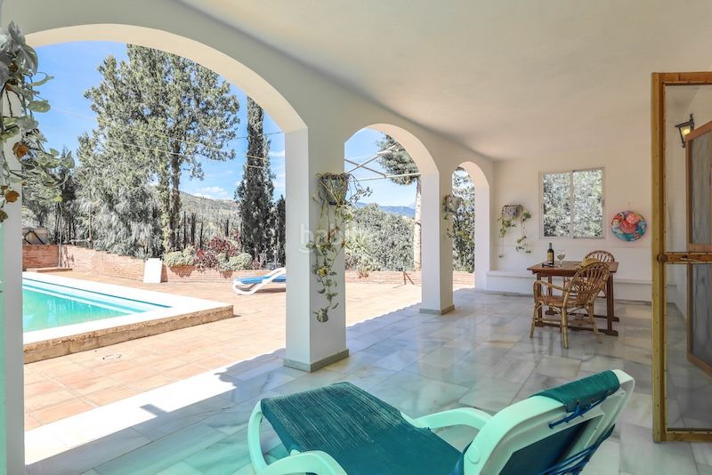 Foto c26f6a2a-83dc-486f-969a-8afafe95b6a7. Casa amb xemeneia aparcament piscina a Guaro