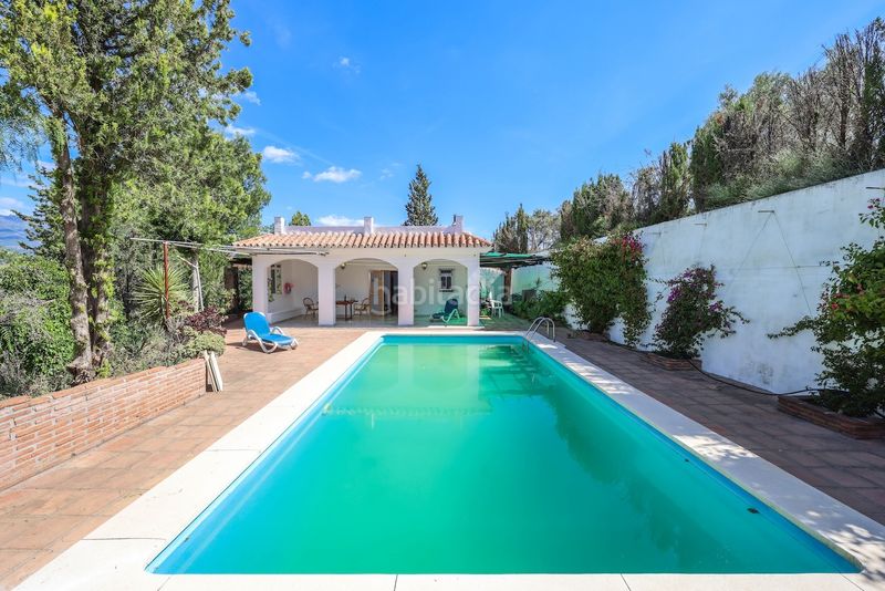 Foto d2c84cf4-b031-4dd3-b841-1511dbc1e511. Casa amb xemeneia aparcament piscina a Guaro