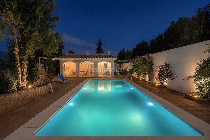 Foto f7140623-8b42-480b-b5b2-66f607383cb5. Casa amb xemeneia aparcament piscina a Guaro