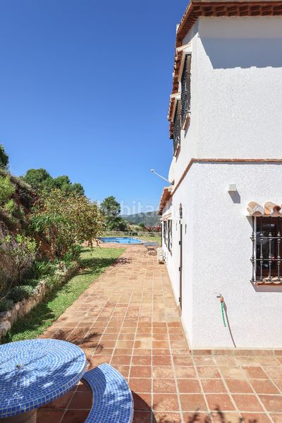 Foto 181ac42d-9e3f-41a3-8f28-901d2c85b697. Casa amb xemeneia aparcament piscina a Guaro