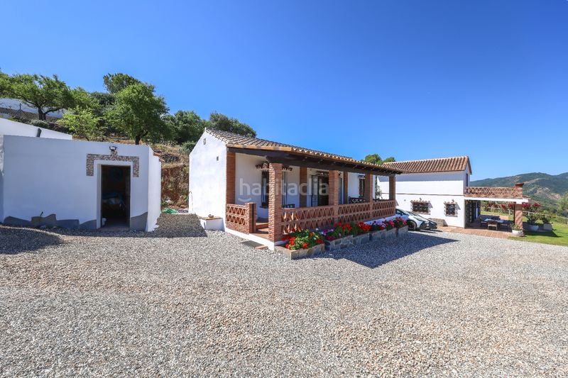 Foto 7e75a7fb-04e6-4bd6-8668-c3ff71d09a9a. Casa amb xemeneia aparcament piscina a Guaro