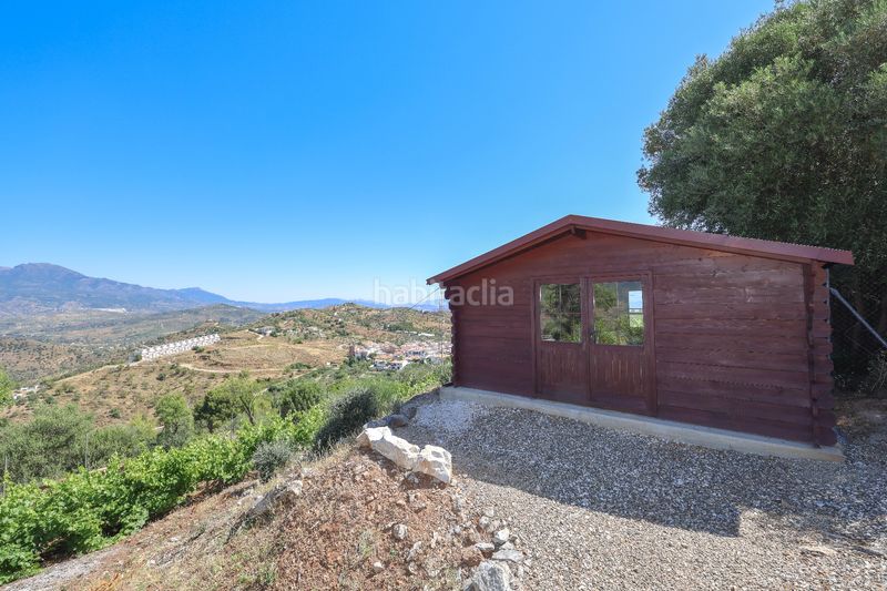 Foto aead4746-53ad-4be1-b9aa-fd3727a96244. Casa amb xemeneia aparcament piscina a Guaro