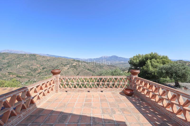 Foto efb592ce-a5c1-4122-86e7-56dcecb059aa. Casa amb xemeneia aparcament piscina a Guaro
