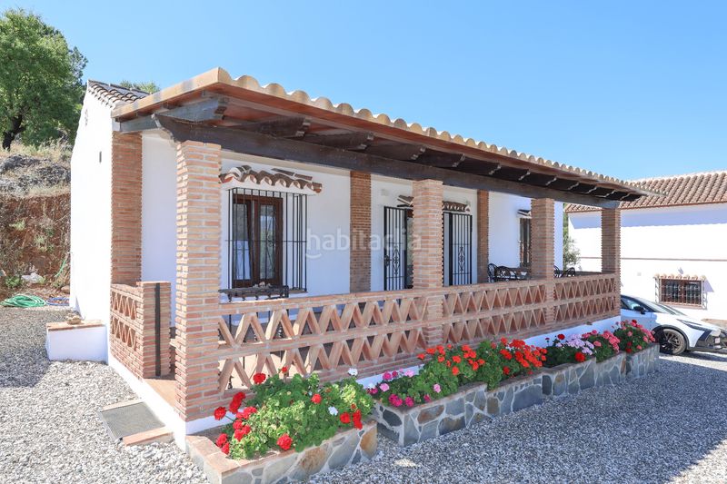 Foto f15f5547-f8d8-481d-8270-ea2a38d61a2d. Casa amb xemeneia aparcament piscina a Guaro