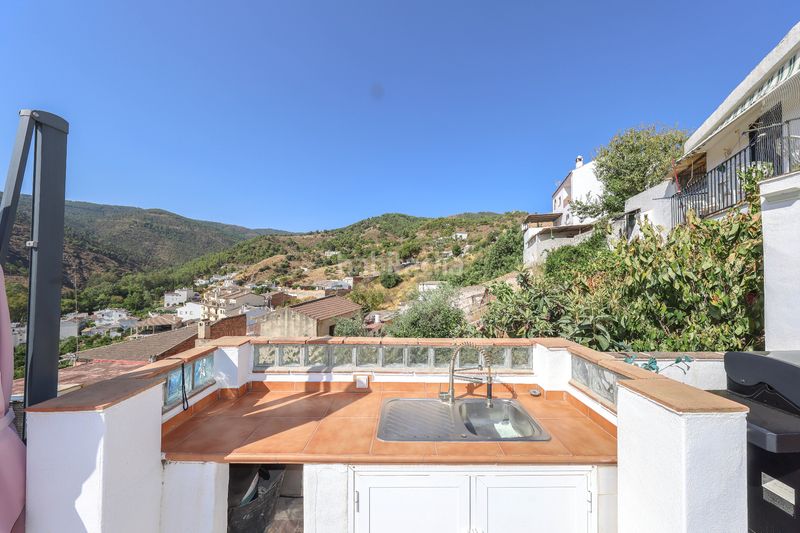 Foto a7ee3b39-8a1e-491b-ade7-fd09b81af131. Casa adossada a Tolox