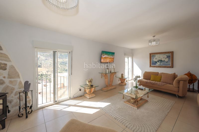 Foto c7bbb03a-5b73-4782-b11a-cfd771282c5e. Casa adossada a Tolox