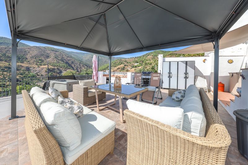 Foto fe8cd2e9-3412-4ade-b4ab-788d83594b22. Casa adossada a Tolox