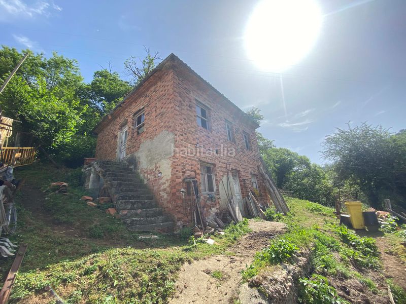 Foto b51cc584-fdb6-4c21-9858-f4d9006426ce. Casa adossada a Bimenes