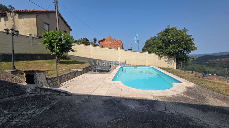 Foto 49a4be2c-19a1-406e-9feb-fb71bf43c6eb. Casa amb calefacció aparcament piscina a Pravia