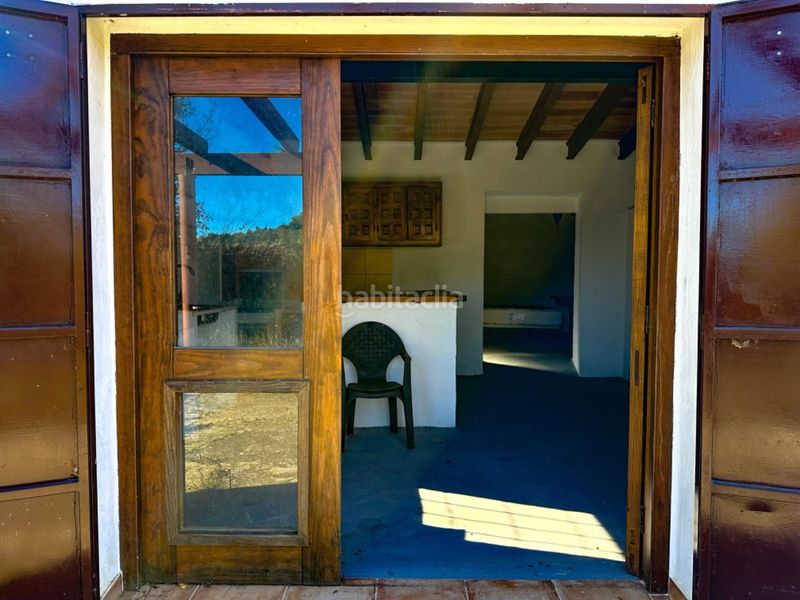 Foto 1bad243e-b2c8-40ca-b2e2-e235af816cd3. Casa amb aparcament a Confrides
