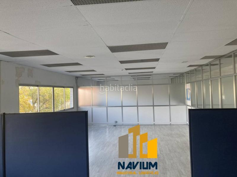 Foto cd2c7a23-979f-49ae-9a36-90a1c7c63245. Rent industrial building in Estación Coslada